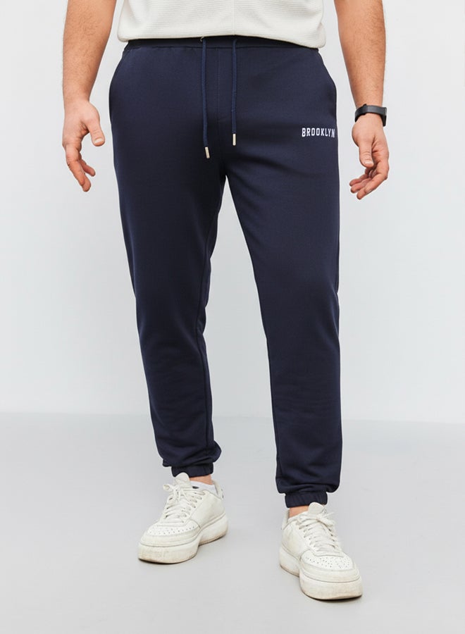 trendyol Navy Blue Regular Fit Printed Elastic Leg Sweatpants TMNSS22EA0121 - Image 3