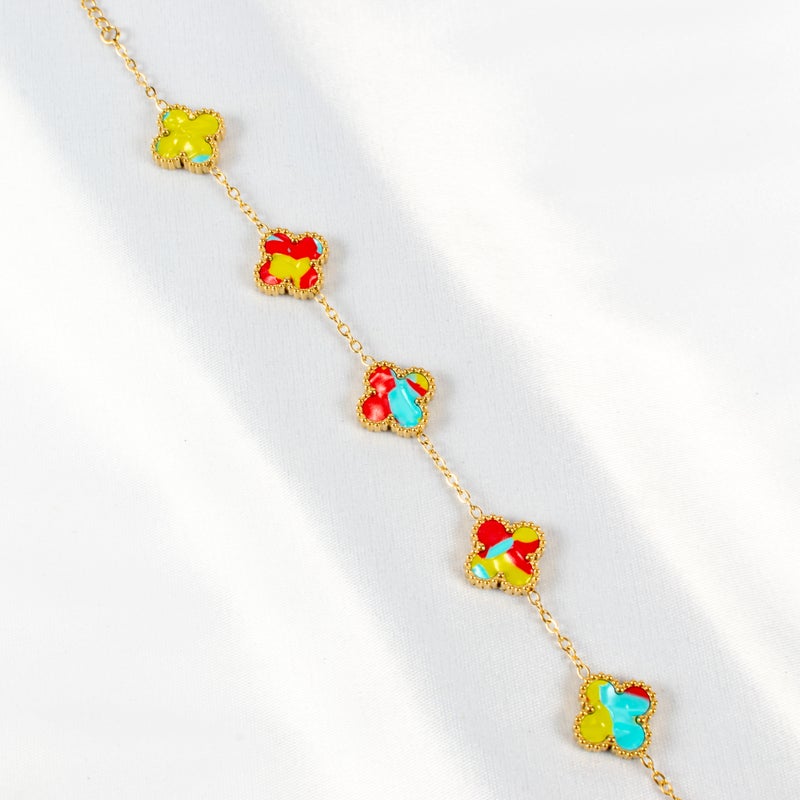 ذا بلاك بيرل اكسسوريز أنسيال أستانليس ستيل ذهبي مع شكل زهرة البرسيم بألوان خلابة - Image 2