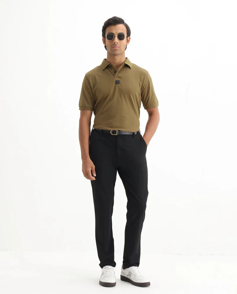 Rare Rabbit Men's Silicon Badge Branded Solid Polo