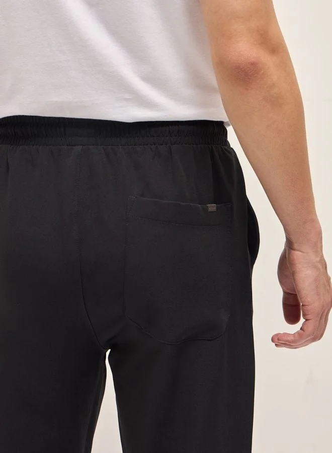 THE BEAR HOUSE  Men's Black Classic Korean-Inspired Elastic Waist Casual Trouser Versatile Office and Travel Pants Comfortable Fit for Everyday Use Easy to Style Bottomwear for Work Weekend and Outings for Men | Best Price UAE