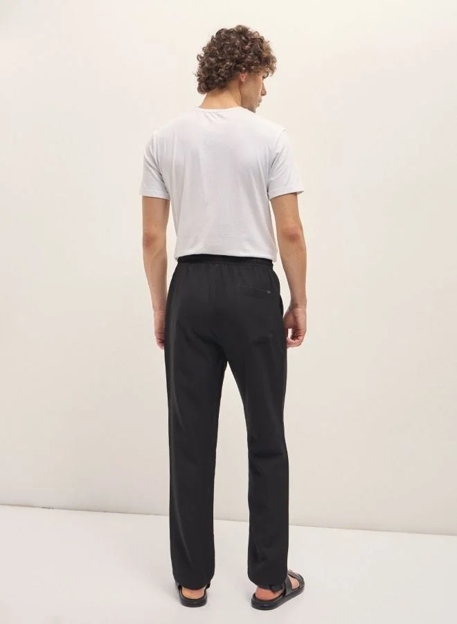 ذا بير هاوس بنطلون كاجوال رجالي أسود بخصر مطاطي مستوحى من الطراز الكوري