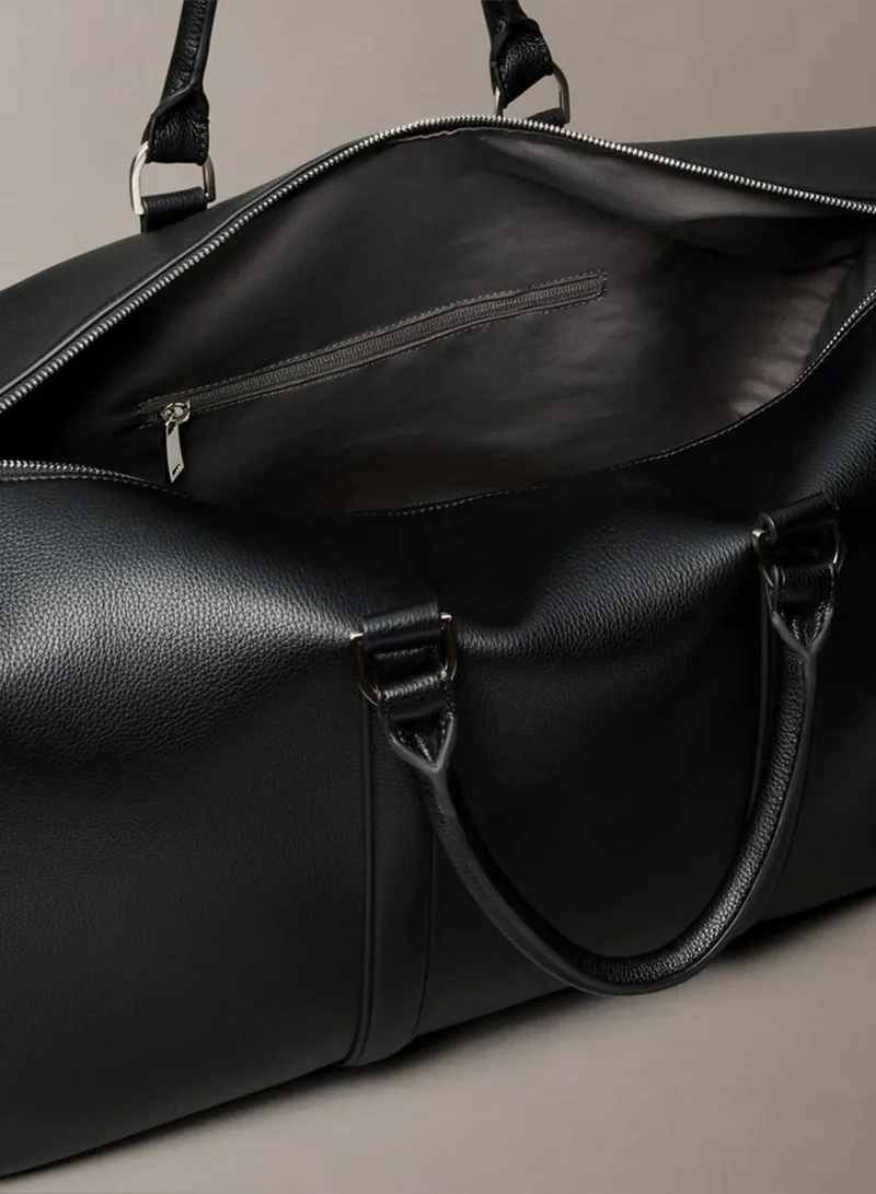 Calvin Klein Black Micro Pebble Duffle Bag for Men | Best Price UAE