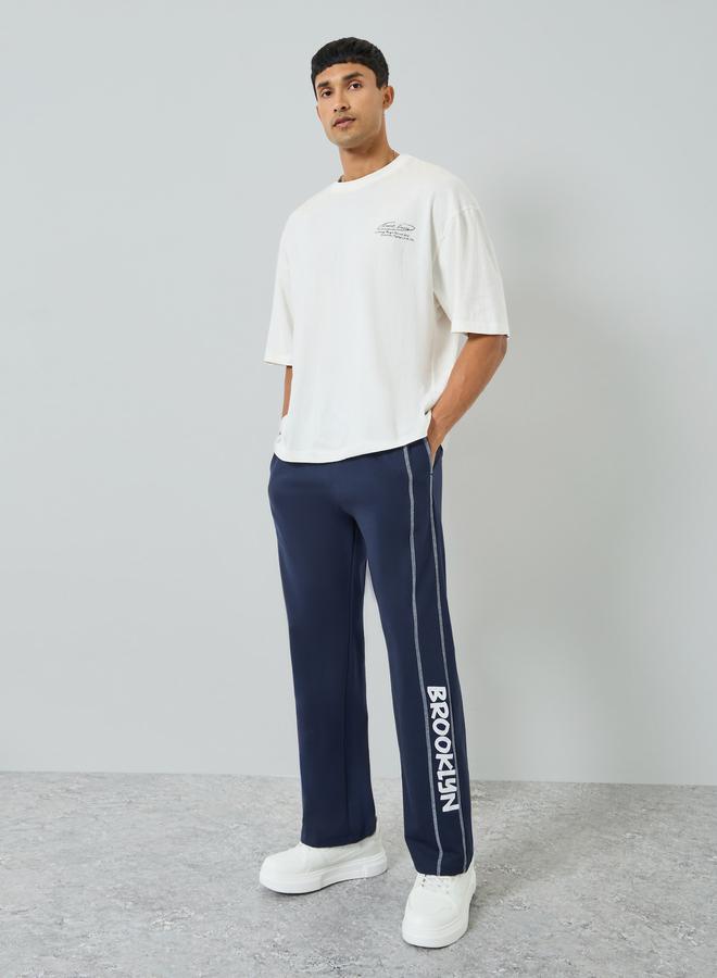 Styli Men Navy Blue Oversized Side Panel Print Joggers - Image 2