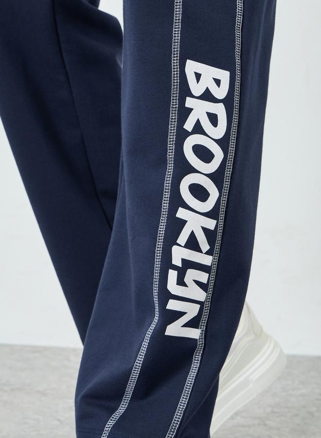 Styli Men Navy Blue Oversized Side Panel Print Joggers - Image 3