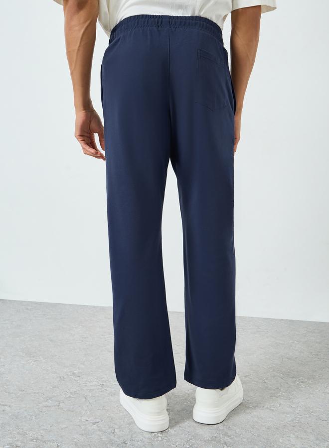 Styli Men Navy Blue Oversized Side Panel Print Joggers - Image 4