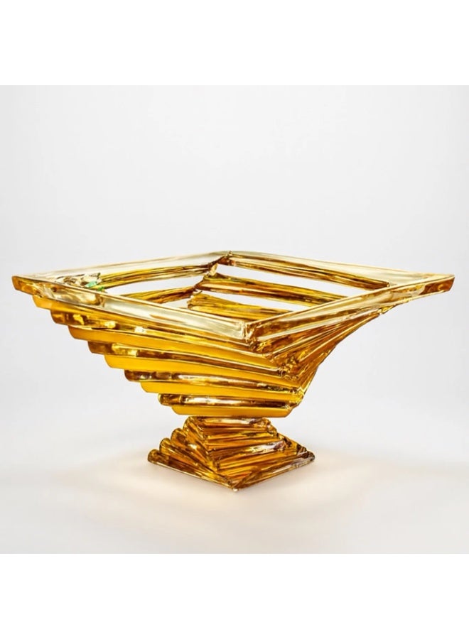 هذي التمرية الفخمة قطعة ديكور بحد ذاتها، مصممة عشان تزيد ضيافتك أناقة ورقي. بتصميمها "السبايرل" (الحلزوني) الفريد واللون الكهرماني الدافئ، هي الخيار الأمثل لتقديم التمور، الحلويات، أو حتى المكسرات بشكل يسر العين ويجمل المجلس. - Image 4