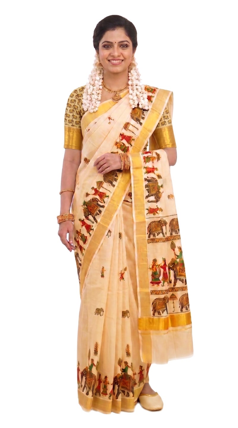 YETTALAN® Women's Mural Printed Kerala Gold Tissue Saree with Running Blouse Piece (Elephant Pradaksinam) - Image 1