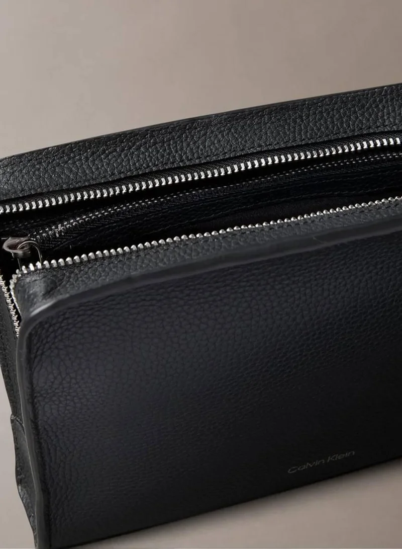 Calvin Klein Black Foil Embossed Logo Pouch for Men | Best Price UAE