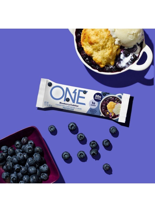 وان ONE Protein Bars، وصفة جديدة لفطيرة التوت الأزرق، ألواح بروتين خالية من الجلوتين تحتوي على 20 جرامًا من البروتين و1 جرام من السكر، أساسية في المؤن، 2.12 أونصة (12 قطعة)  - Image 2