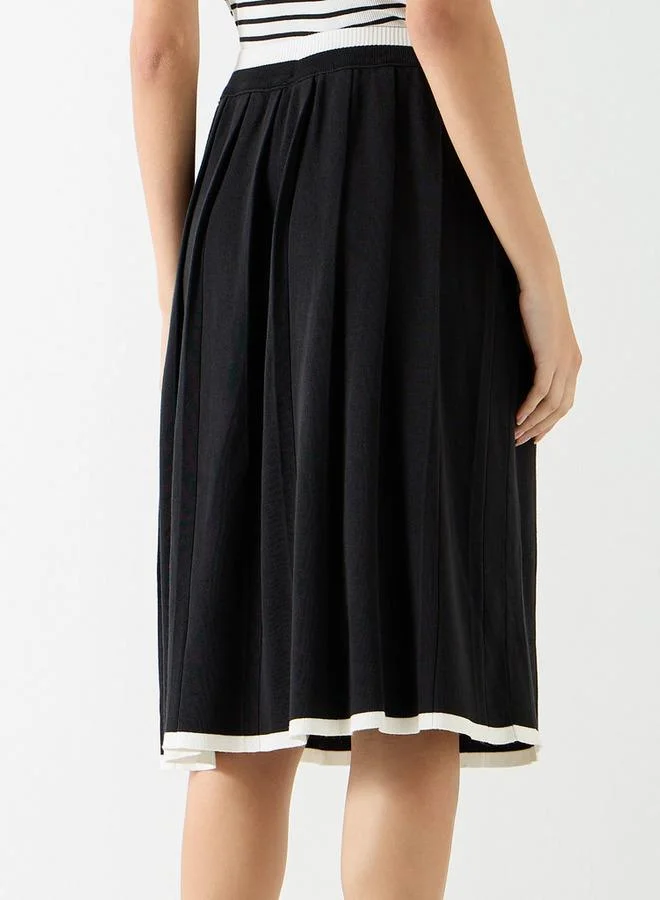 تواكستريمز تنورة إيه لاين بارزة الملمس بطول الركبة من تو إكستريمز