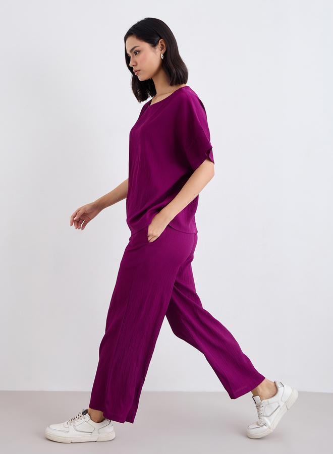 ستايلي طقم بلوزة مستديرة بياقة مضلعة وبنطلون واسع - Image 1