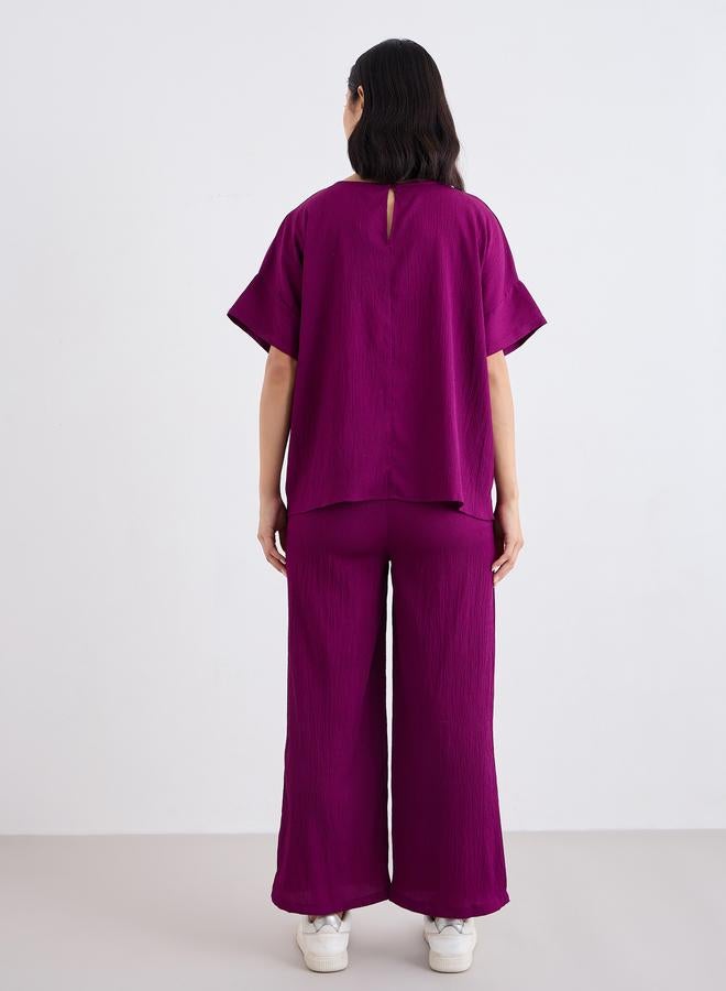 ستايلي طقم بلوزة مستديرة بياقة مضلعة وبنطلون واسع - Image 4