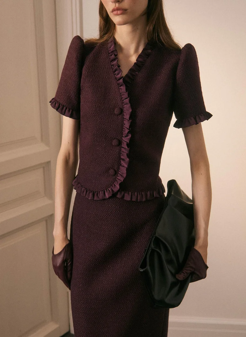 Straight-cut tweed blouse with ruffles