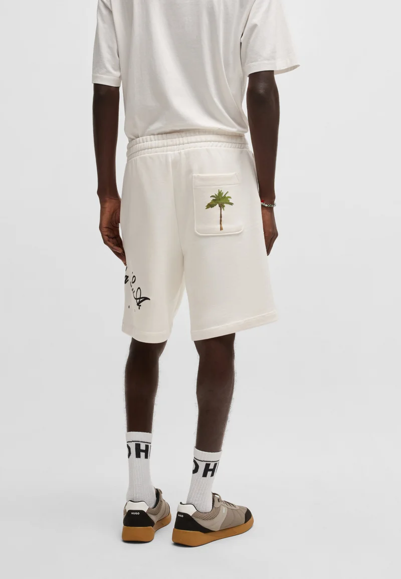 هوجو شورت قطن تيري برسومات شعار