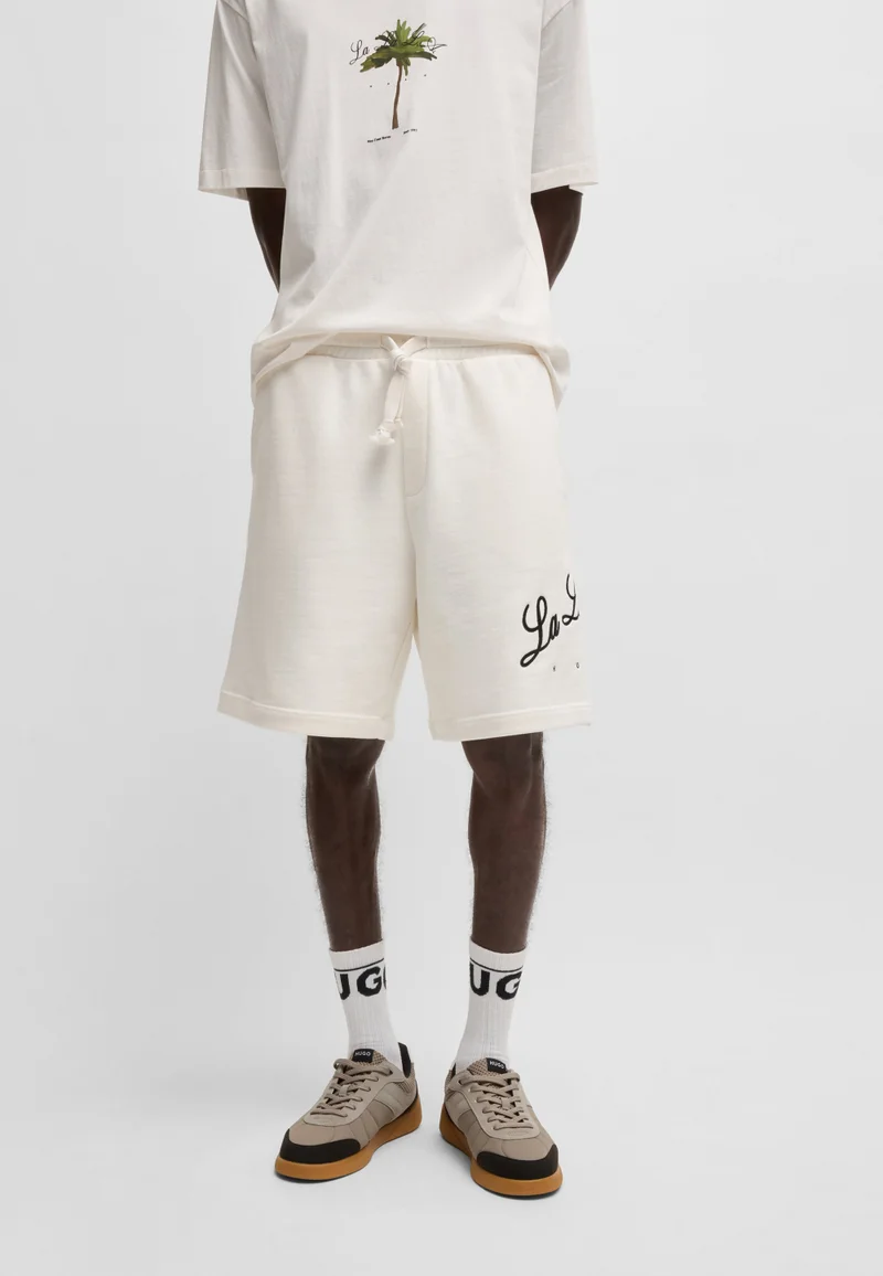 هوجو شورت قطن تيري برسومات شعار