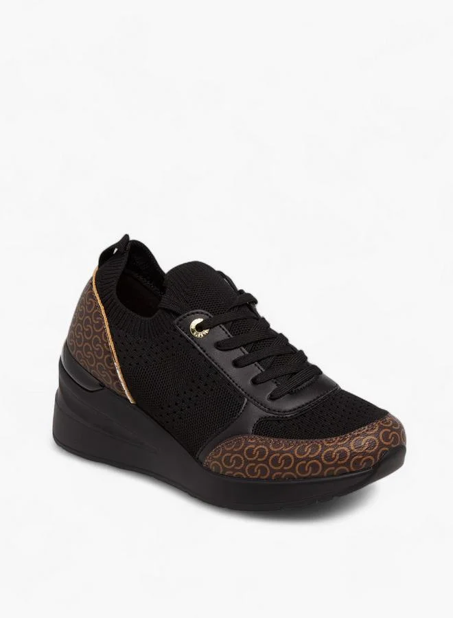 سيليست Women's Monogram Print Lace-Up Sneakers with Wedge Heel