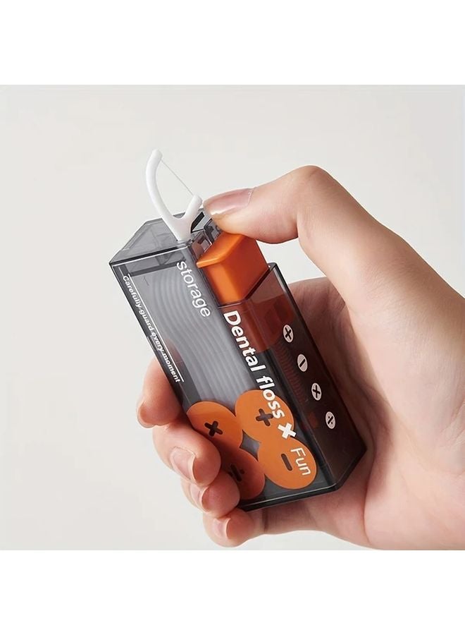 جهاز أسود محمول لخيط الأسنان مع 10 أعواد يمكن التخلص منها - عناية فموية مدمجة للسفر - Image 1