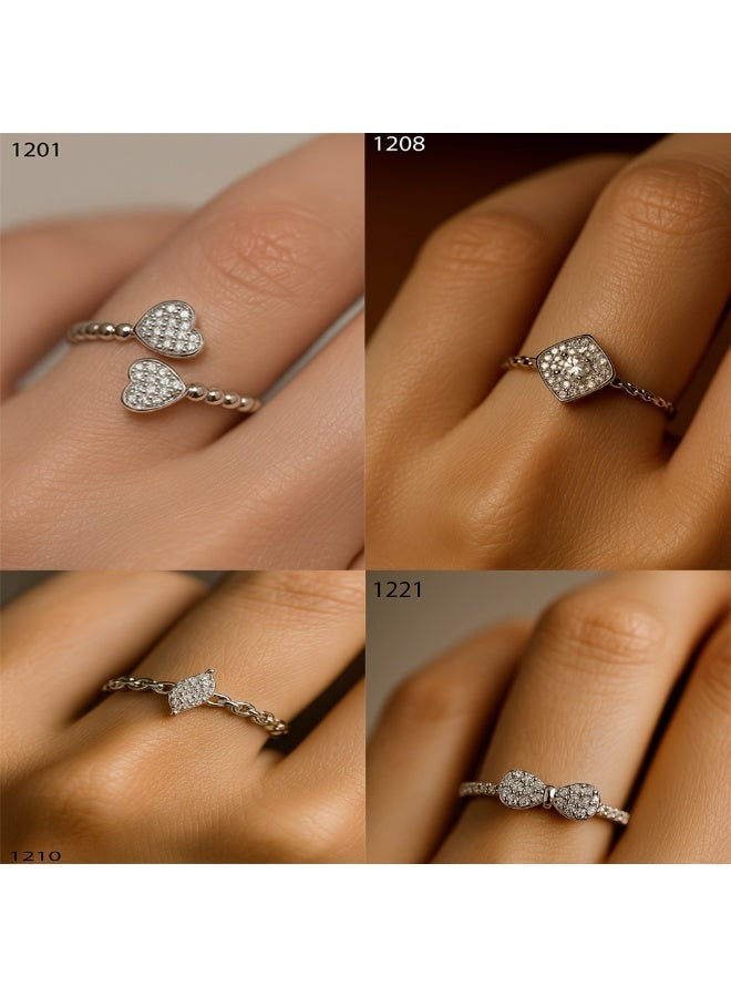 ثري دايموندز بندل 4 خواتم مطلية بلاتين وروديم بفصوص زركون لامعة – طقم راقي ومميز للستات بستايل ناعم - Image 1
