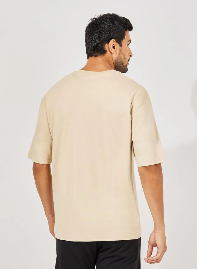 Styli Oversized Embroidered Slogan Interlock T-Shirt