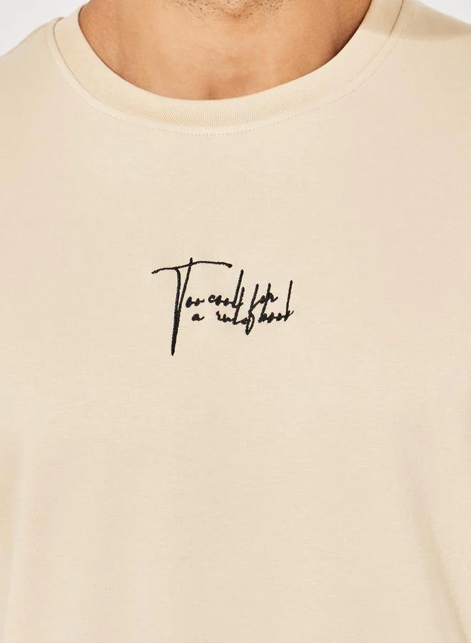 Styli Oversized Embroidered Slogan Interlock T-Shirt