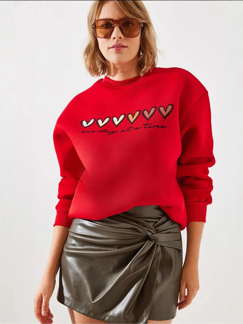 Bianco Lucci LUCCI Heart Patterned Crew Neck Sweatshirt