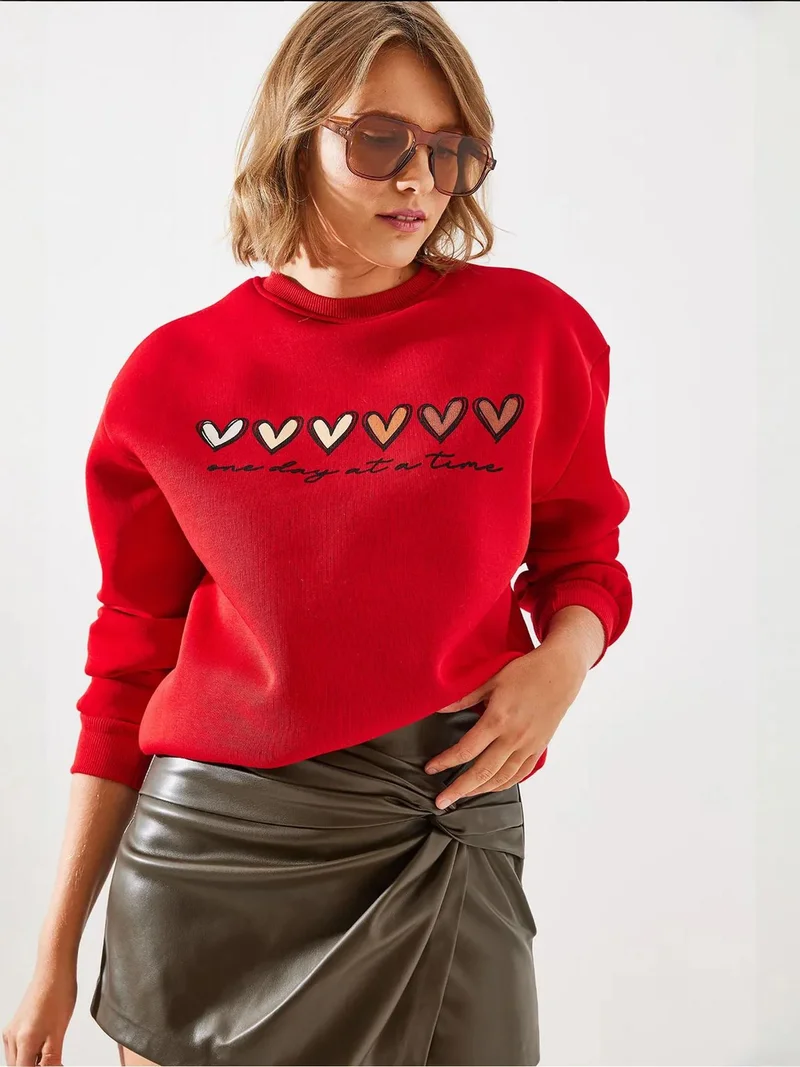 Bianco Lucci LUCCI Heart Patterned Crew Neck Sweatshirt