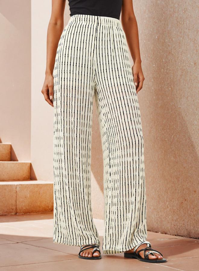 تواكستريمز بنطلون واسع الساق بنقوش - Image 1