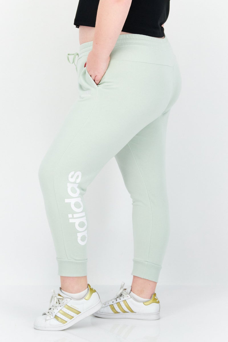 Adidas سروال جوجر للنساء بحجم زائد مع حبل سحب وشعار العلامة التجارية، أخضر نعناعي - Image 2