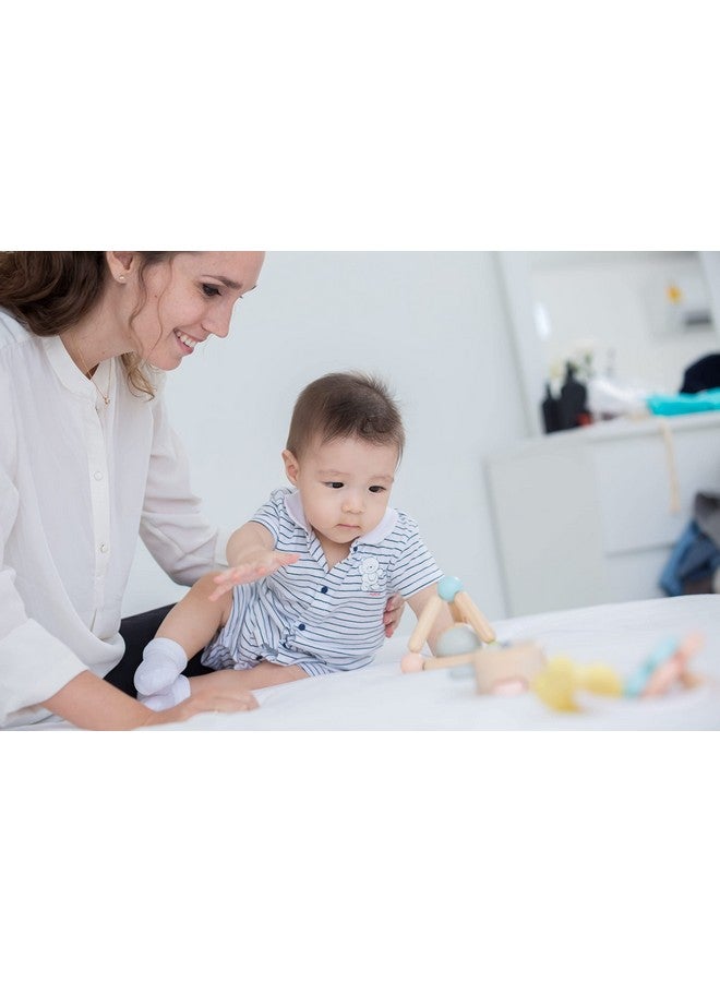 PlanToys Wooden Clutching Triangle Baby Toy with Gentle Sound in Two-Toned Ball (5256) | Pastel Color Collection |Sustainably Made from Rubberwood and Non-Toxic Paints and Dyes - Image 5