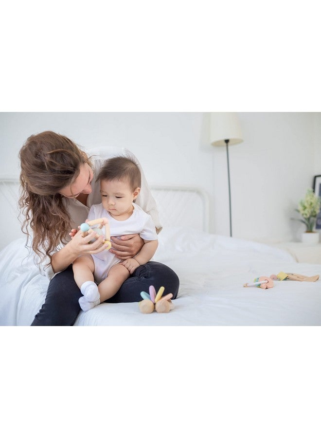 PlanToys Wooden Clutching Triangle Baby Toy with Gentle Sound in Two-Toned Ball (5256) | Pastel Color Collection |Sustainably Made from Rubberwood and Non-Toxic Paints and Dyes - Image 4