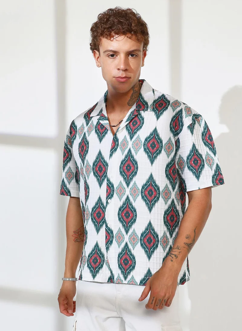 Campus Sutra Campus Sutra Men's Chalk White Ikkat Motif Oversized Shirt For Casual Wear | Cuban Collar | Short Sleeve | Button Closure | Oversized Shirt Crafted With Comfort Fit For Everyday Wear