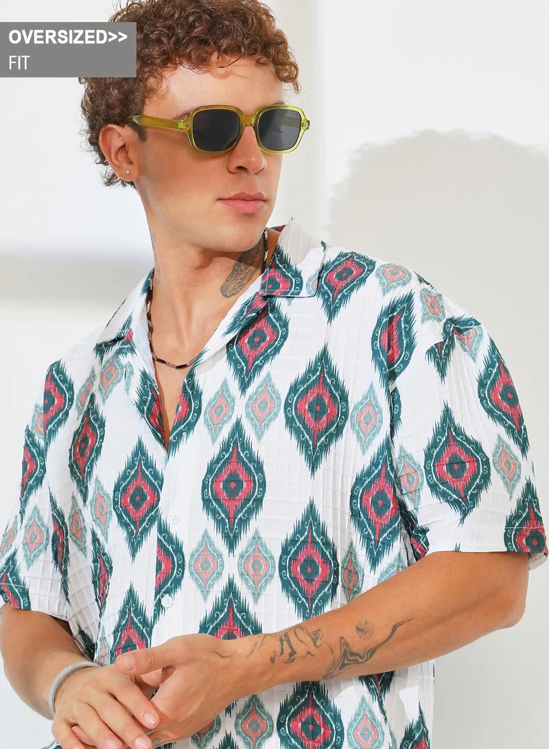 Campus Sutra Campus Sutra Men's Chalk White Ikkat Motif Oversized Shirt For Casual Wear | Cuban Collar | Short Sleeve | Button Closure | Oversized Shirt Crafted With Comfort Fit For Everyday Wear