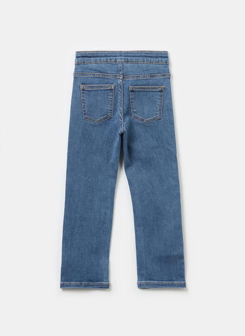 او في اس Flare-fit stretch jeans