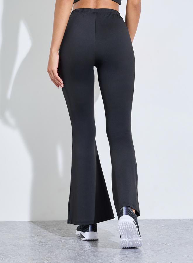Styli Active Black Solid Contrast Seam Active Flare Pants - Image 4