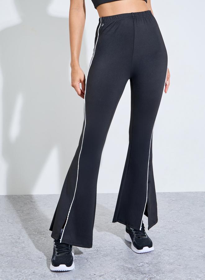 Styli Active Black Solid Contrast Seam Active Flare Pants - Image 1