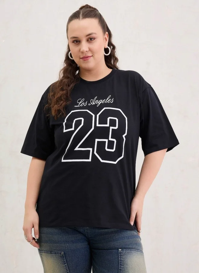 SASSAFRAS Black Typography Printed Oversized T-Shirt for Women