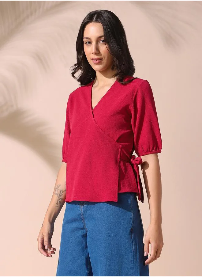Dennis Lingo Women pink regular fit solid half sleeves t-shirt polyester blend top with wrap closure- where comfort meets classic charm.