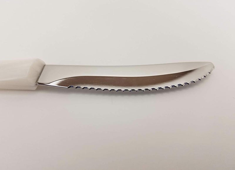 Cutco Model 1759 Table Knife with White (Pearl) handle....................3.4” High Carbon Stainless DD serrated blade.............in factory sealed plastic bag. - Image 1