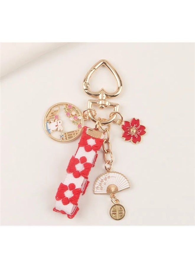 yongsheng Key Ring, Key Chain, Style Keychain with Red and White Floral Ribbon, Gold Tone Metal Charms Including Fan and Coin, Ideal for Keys, Bags, Car Keys and Phone Cases, Perfect for Travelers and Gifting  - Image 2