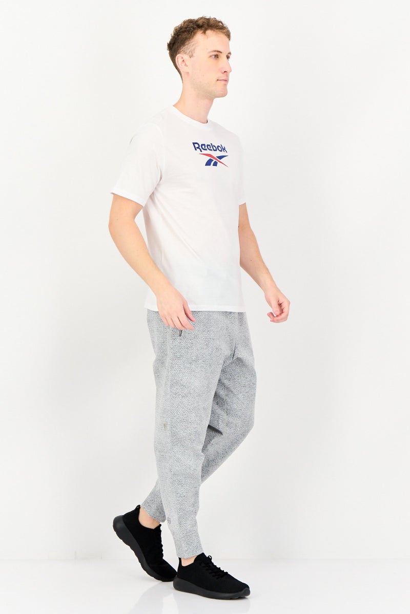 Reebok تي شيرت رياضي للرجال بأكمام قصيرة مناسب للخارج، أبيض - Image 4