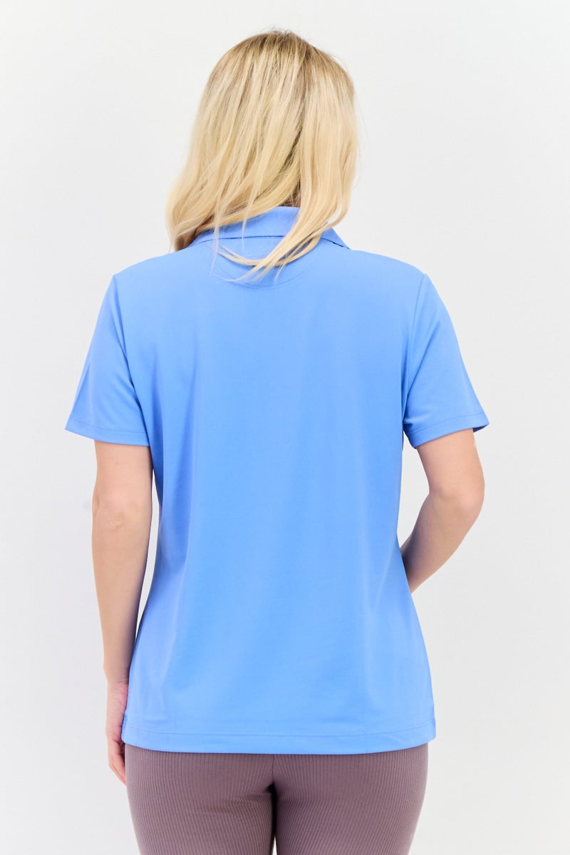 Greg Norman تي شيرت بولو خارجي قصير الأكمام للنساء، أزرق فاتح - Image 3