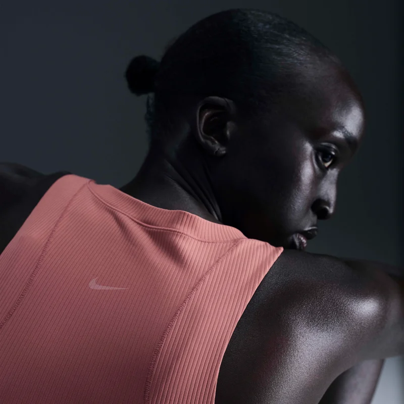 Nike Peach Women's Zenvy Dri-FIT Yoga Tank Top for Women | Best Price UAE
