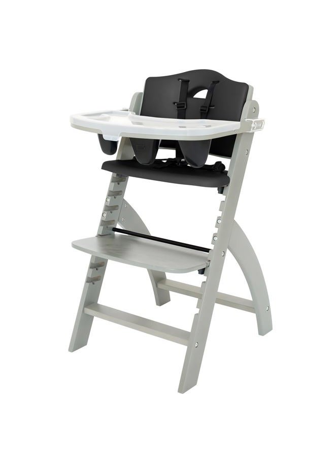 Abiie Beyond Junior Wooden High Chair for Babies and Toddlers - Convertible 3-in-1 Baby Highchair with Removable Tray - 6 Months to 250 Lb - Water Resistant - Misty Grey Wood/Black Pearl Cushion - Image 1