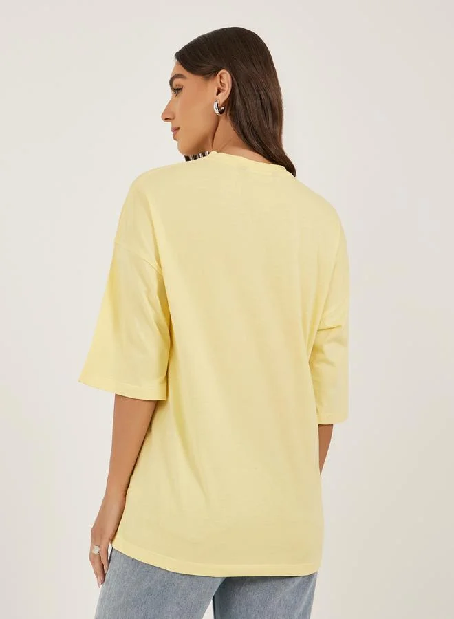 ستايلي Slogan Print Dropped Shoulder Oversized T-Shirt