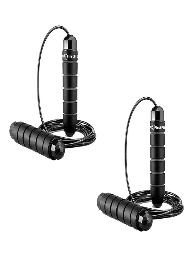 حبل قفز احترافي من FirstFit، خالٍ من التشابك، سريع الحركة، مزود بمحامل كروية، مناسب للنساء والرجال والأطفال، حبل قفز فولاذي قابل للتعديل بمقابض إسفنجية - أسود (عبوة من قطعتين) - Image 1