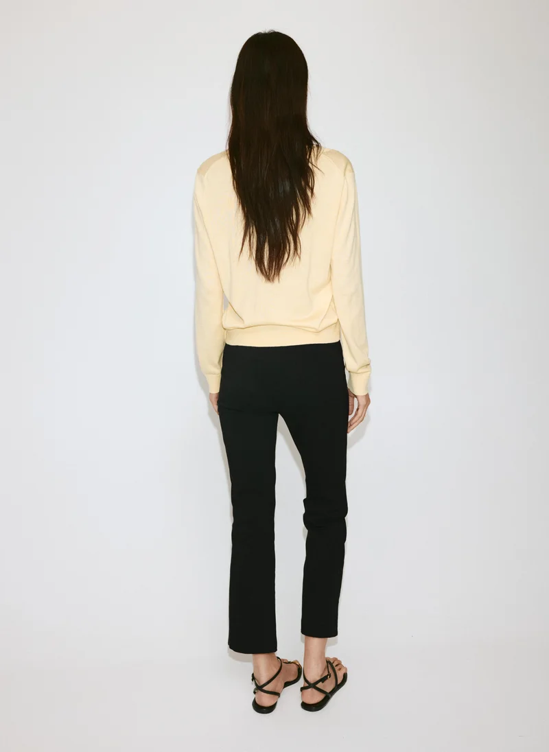 مانجو V-Neck Knit Sweater