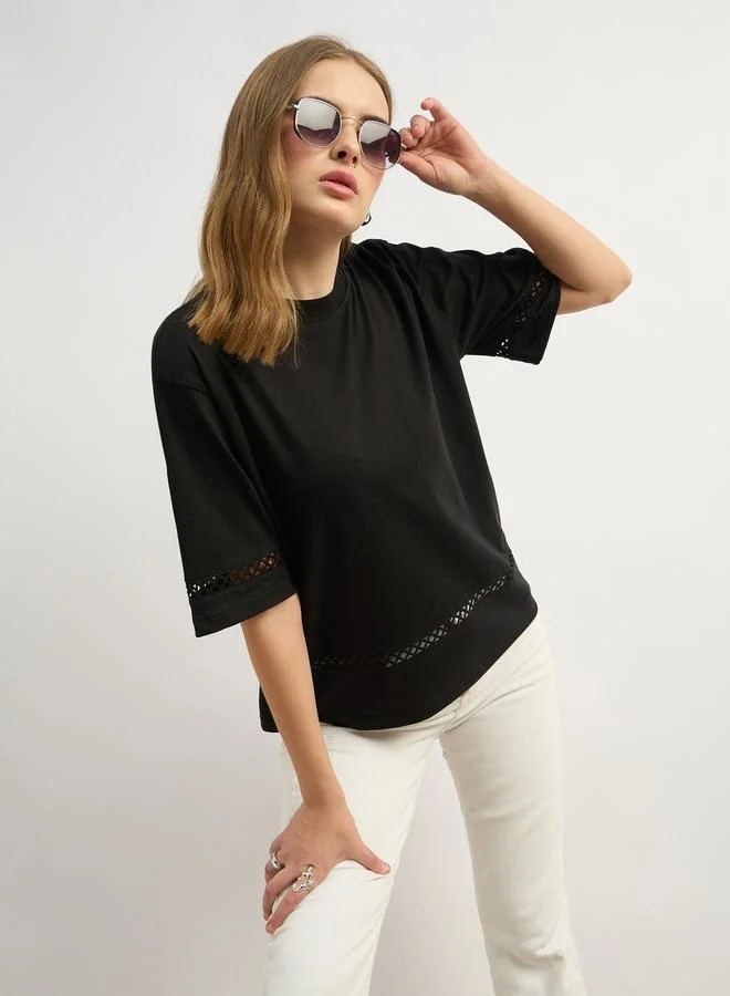 Styli Solid Round Neck Boxy Fit T-Shirt with Lace Trim Detail