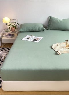 LUNA Home 3-Piece Set: queen-size fitted bedsheet and two pillowcases, washable cotton in a green color.  - Image 2