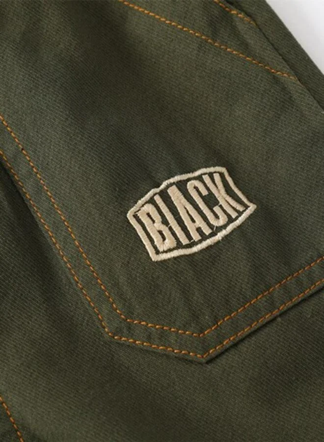 YUNIQEE Green Regular Fit Mid Rise Solid Denim Shorts