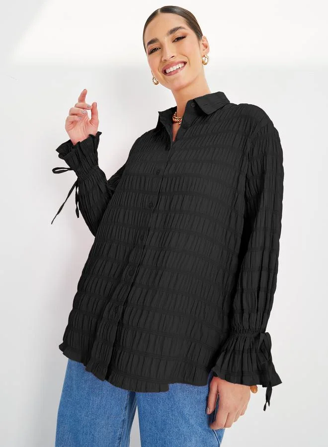 ستايلي Textured Oversized Longline Shirt with Buttons